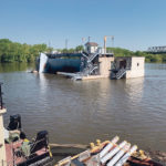 Flood waters in the Mississippi River system, such those surrounding the Peoria Lock and Dam in Peoria, Illinois, May 16, may be threatening fertilizer shipments this year. | Reuters photo