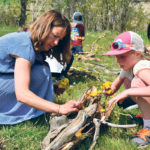 Georgia Dale, left, helps Rudy Barrios and Luke Smith with an art project using media collected along Pincher Creek. | Barb Glen photo
