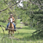 Joel Martens, riding Quigley, heads out to track the prey after a 20 minute head start. | Maria Johnson photo
