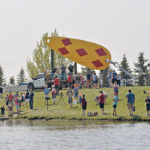 The unveiling of a monumental lure took place June 1 at the annual Kids Can Fish event, where the Len Thompson Community Fish Pond was restocked with yearling rainbow trout. Children had the opportunity to personally carry the young fish down to the water in pails and release them into the water. The Lacombe Fish & Game Association was on hand with a hundred fishing poles to lend to those who wanted to try their hand at fishing. | Maria Johnson photo