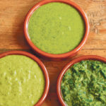 Sauces made from fresh garden herbs can be used in many ways with your summer grilling and salads. These sauces are, clockwise from the top, mint pesto, zhoug and Silver Palate’s green sauce. | Sarah Galvin photo