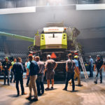Claas dealers examine the company's new 8000-7000 series combines during a launch event in Nebraska July 15.