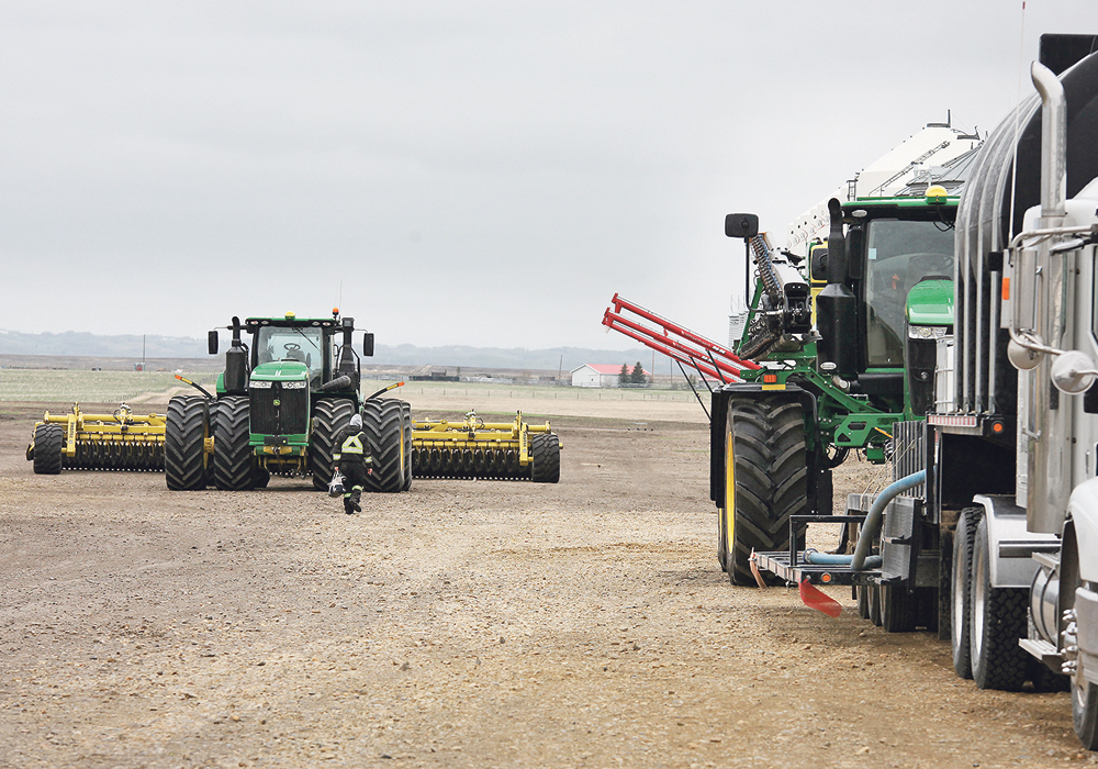 Now with 24 inches of moisture this season, the Woolliams farm in the foothills near Calgary has a few ruts to fix. But running a single sprayer on a 9,000 acre operation appears to work.  |  Michael Raine photo