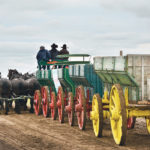24-2 Draft Horses and Diamond B Ranch teamed up to present an 18-horse hitch pulling four grain wagons. | Janet Kanters photo