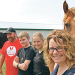 Jeff, Dean, Karlee and Janet Friesen on their farm near Landmark, Man. | Ed White photo