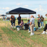 Farmers and dealers gather at Corteva’s new research and development facility east of Saskatoon in August. | Robin Booker photo