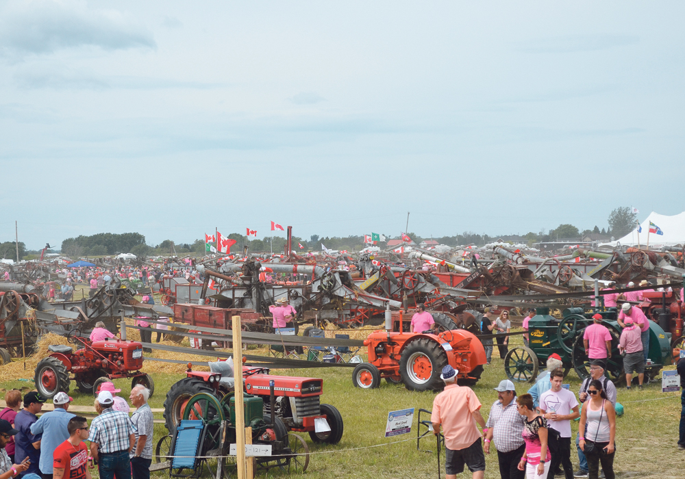 The Guinness world record for “most harvesters working at the same time for five minutes” was reached in St. Albert, Ont., Aug. 11 with 243 threshing machines operating simultaneously.  |  Candice Vetter photo