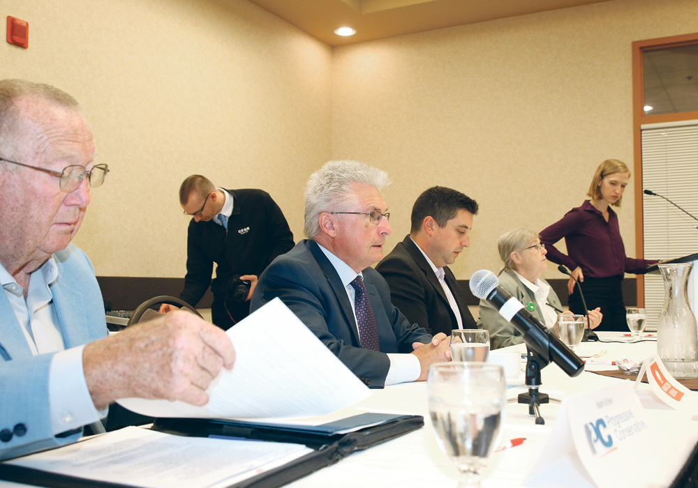 Left to right: Ralph Eichler, Terry Hayward, Mitch Obach, Martha Jo Willard, moderator Ashley Robinson.  |  Ed White photo