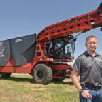 Bob Cochran, general manager of Highline Manufacturing, talks up the AccuMix AM 1000s in Vonda, Sask. | William DeKay photo