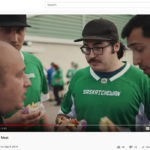 An A&W ad currently running shows people wearing Rider gear trying the restaurant's meatless Beyond Meat burgers outside Regina's Mosaic Stadium. | Screencap via YouTube/A&W Canada