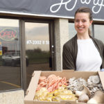 Rachel Yadlowski shows some of the mushrooms grown in her family’s indoor farm. | Mary MacArthur photo