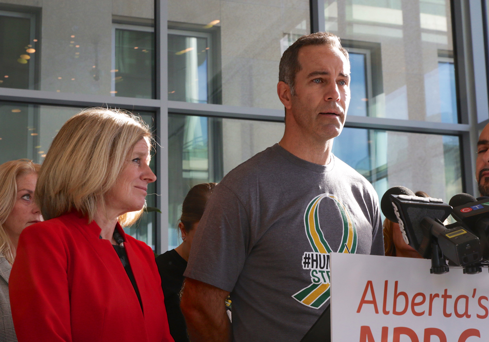 NDP Official Opposition Leader stands with Chris Joseph, who lost his son Jaxon in the Humboldt Broncos bus crash tragedy. | Jeremy Simes photo