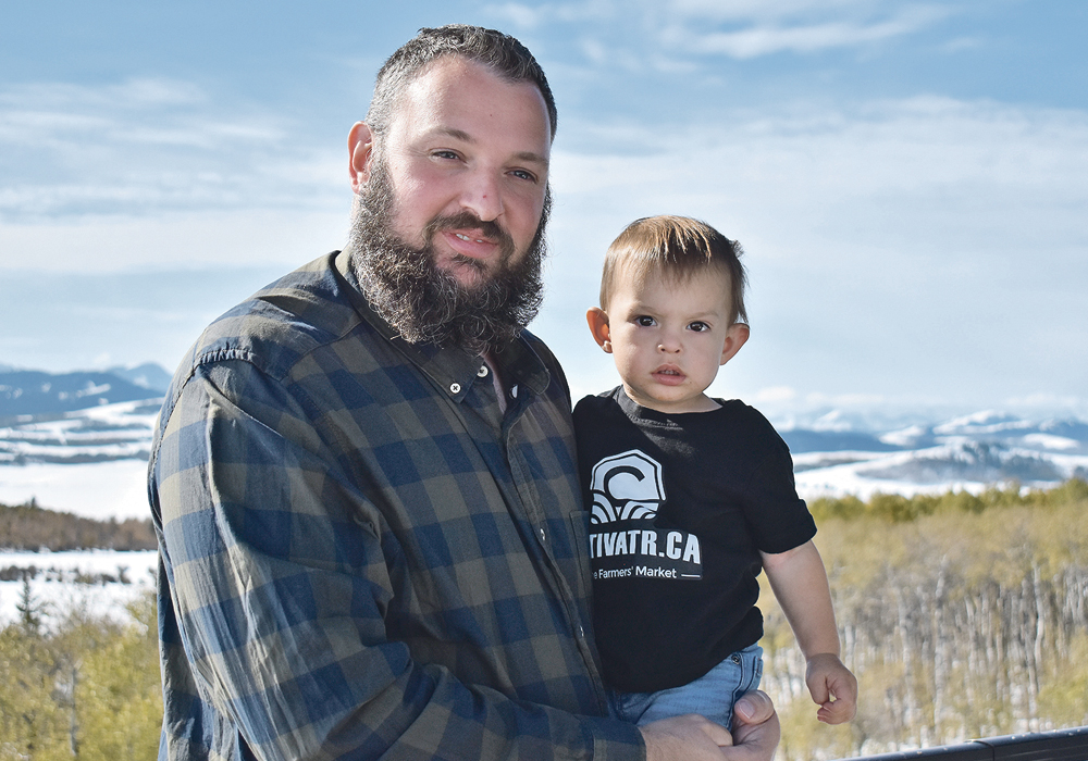 Cultivatr founder Dan Berezan, seen here with 18-month-old son Brody, wants to take the emotion out of supply and demand.  |  Barb Glen photo