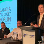 Curtis Rempel, a vice-president with the Canola Council of Canada, addresses attendees on the final day of the Canola Discovery Forum in Winnipeg. | Ed White photo