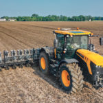 Sabanto Ag offered a robotic planting service to U.S. growers in the Spring of 2019. This JCB Fastrac tractor drives autonomously and is fitted with an 18 row planter, and can be loaded on a standard single-drop semi-trailer. | Chad E. Colby photo