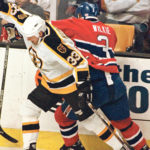 Sheldon Kennedy, seen here on the left when he played in the National Hockey League, is better known for going public about sexual abuse he suffered when he was younger, but now he wants to be known for something else — Saskatchewan grain farmer. | Reuters photo