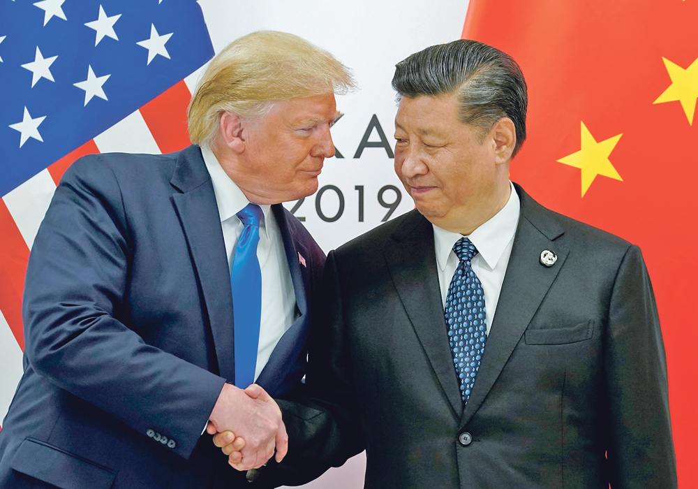 An international analyst says U.S. President Donald Trump and Chinese President Xi Jinping are contributing to the rise of geopolitics.  |  REUTERS/Kevin Lamarque photo