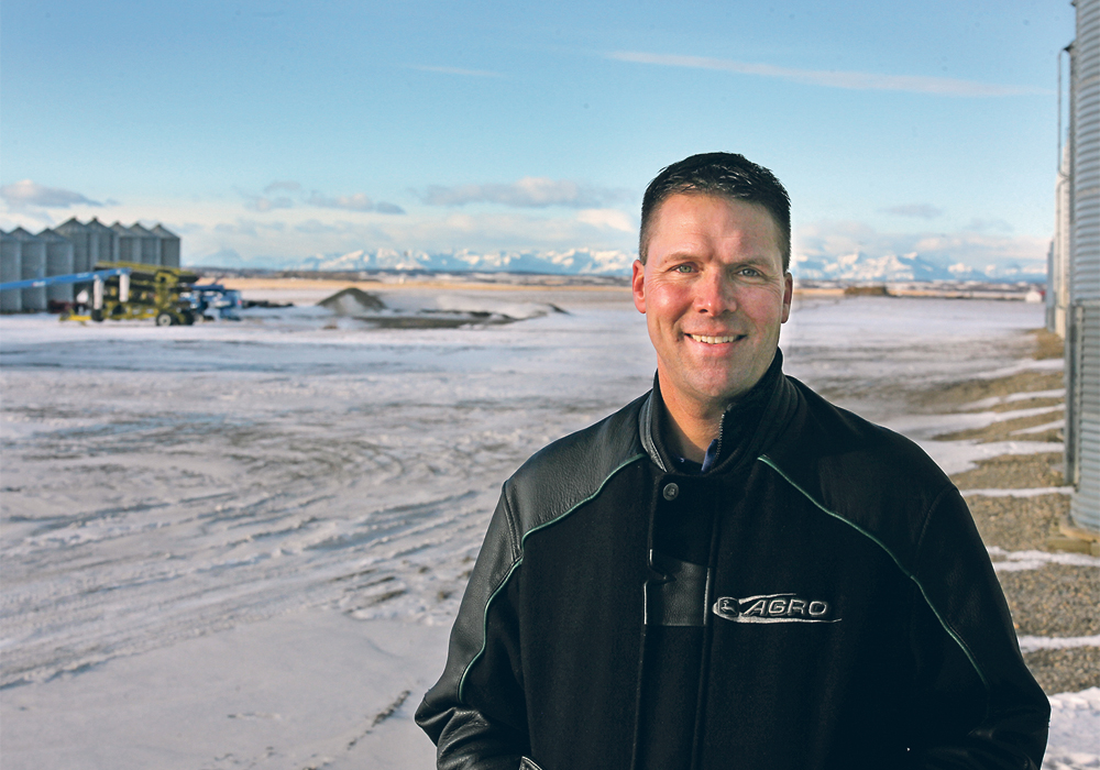 Larry Woolliams remains optimistic about his remaining crop in the field. The 2019 harvest season was not ideal, but his choices in new equipment paid off well, says the Alberta farmer.  |  Michael Raine photo