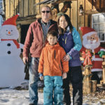 Gary, Susana and Ryker Porttin have created a winter wonderland at R Family Tree Farm. | Maria Johnson photo
