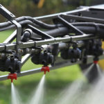 From Jan. 1, there must be a five-metre gap between sprayed fields and housing for shorter crops like cereals and a 10-metre zone for taller crops like fruit trees, the agriculture, environment and health ministries said in a joint statement. | File photo