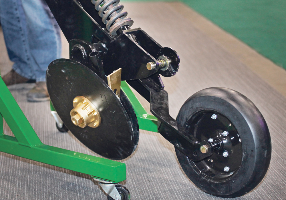 K-Hart’s new 9612 under-cut disc opener system for the Deere 1890-95 drill’s toolbar.  |  Michael Raine photo