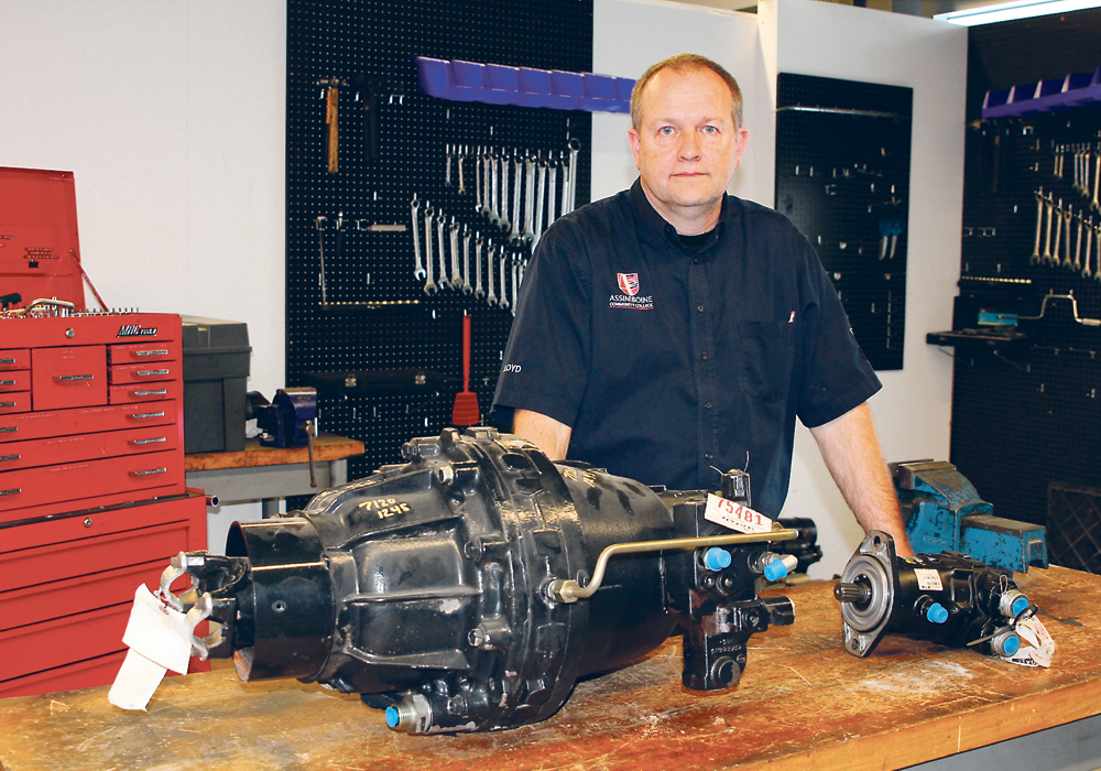 Lloyd Carey, an instructor at Assiniboine Community College in Brandon, donated combine parts worth more than $95,000 to the college. Students in the heavy duty equipment and ag equipment technician program will use the parts for practice and training.  |  Assiniboine Community College photo