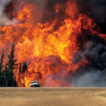 A circulation pattern in the jet stream that caused an extreme heat wave is partially blamed for the wildfires that devastated the Fort McMurray, Alta., area in 2016. | REUTERS/Mark Blinch photo