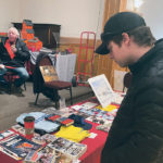 The Lethbridge Antique & Toy Show attracted 1,200 visitors last month, said organizer Larry Samoleski, who can be seen sitting in the background in front of Art Reed’s “Massey Memories” farm display. | Submitted photo