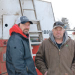 Warren and Lyle Lutz, who farm near Leross, Sask., are facing lost income and higher operating costs after a long and frustrating harvest. | Brian Cross photo