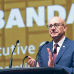 Scott Banda, chief executive officer of Federated Co-op Ltd., addresses nearly 300 delegates representing 168 local co-operative associations during the company’s annual meeting in Saskatoon, March 2. | William DeKay photo