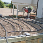 Biobeds come in many forms, including poly tanks, poly-lined wooden frames, poly-lined ground pits and heavy-clay pits. This is a raised biobed at the Canada Saskatchewan Irrigation Diversification Centre at Outlook. Microbes in the biobeds degrade pesticides and reduce the risk of contaminating water. | File photo