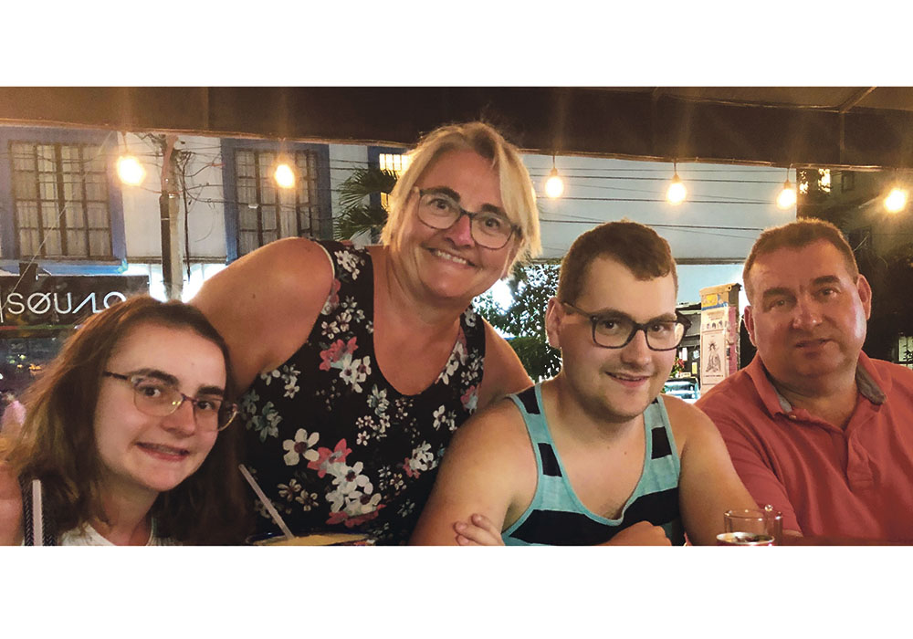  John Guelly, right, farms near Westlock, Alta. with his family. The kids have returned home from university.  |  John Guelly photo