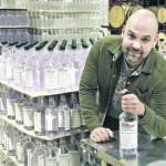 Michael Goldney of LB Distillers in Saskatoon with the hand sanitizer his company is manufacturing. | William DeKay photo