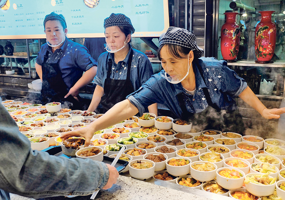 Urban residents in China consume 17 percent more red meat and 28 percent more poultry when they dine out compared to eating at home.  |  Jason Lee photo