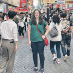 Ellen Crane walks through a crowded street in Osaka, Japan, as part of her research into international perceptions of Canadian beef. | Photo supplied by Ellen Crane
