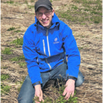 Corteva lead researcher Rory Degenhardt near Edmonton with over-wintered cleavers and shepherd’s-purse. These weeds look like they may be ready to get a jump on the next crop. | Corteva photo