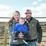 Kendra Donnelly with KorovaFeeders, photographed with husband Bryan and son Owen, says her family is facing extreme challenges during the COVID-19 pandemic. | Canadian Cattlemen's Association photo
