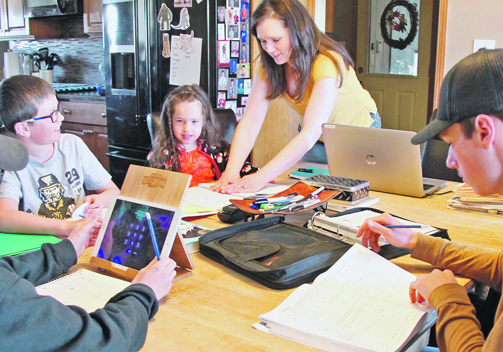 Wendy Weichel has had to adapt to school at home. In addition to her Grade 2-3 class, she is also teaching her four children.  |  Christalee Froese photo