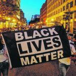 Protesters hold up a Black Lives Matter banner as they march during a demonstration against racial inequality in Washington, D.C., earlier this month. The turmoil seen in the United States and around the world may seem far removed from the Prairies, but people of colour say they also experience racism in rural Canada. | Reuters/Erin Scott photo
