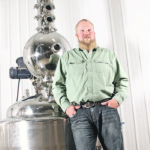 Kevin Lefsrud, who farms near Viking, Alta., started distilling honey as a way to find a creative outlet after retiring from the CFL because of concussions. | Section 35 photo