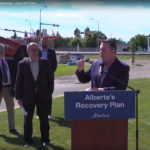The provincial government today announced funding for the project, which will see 46 kilometres between Taber and Burdett, Alta., made into a twinned highway over a three-year period. The project is part of the province's $10 billion economic recovery plan announced in June. | Screencap via YouTube/Your Alberta