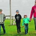 The Kyle family on their Tyvan farm: (left to right) Tanner, Kipton, Macy and mom Codee. | Christalee Froese photo