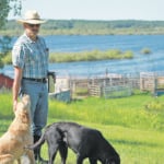 Scott Campbell surveys his pastureland that has been underwater since the beginning of June. | Becky Zimmer photo