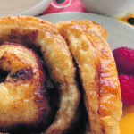 Nothing beats good conversation over a hot coffee, cinnamon bun and fresh berries on the side. | Jodie Mirosovsky photo