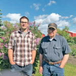 Arnold Balicki, right, brought his son, Leonard, into the farming business long before he started the process of semi-retiring. | Supplied photo