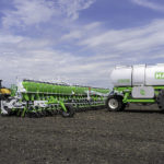 Clean Seed’s system now relies on a 7605 Bulk Transfer Cart that sends bulk product to the seeder as the row meters call for it. There are individual load cells on each of the five tanks in the cart and there is a total capacity of 760 bushels. | Clean Seed photo
