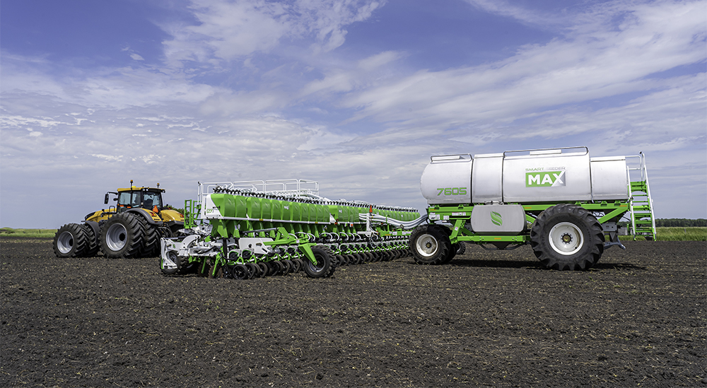 Clean Seed’s system now relies on a 7605 Bulk Transfer Cart that sends bulk product to the seeder as the row meters call for it. There are individual load cells on each of the five tanks in the cart and there is a total capacity of 760 bushels.  |  Clean Seed photo