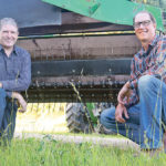 Ben Voss, left, and farmer and inventor Ryan Sommerfeld have found a way to fluff up hay and crop windrows for quicker drying with only a minimum of leaf or grain loss. The first factory-built Aerows will be available late this summer. MSRP ranges from $23,900 to $29,500 depending on options. Aerow requires a minimum of 50 horsepower and 15 g.p.m. hydraulic flow. | Aerow Manufacturing photo