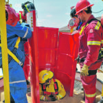 Firefighters perform a mock grain entrapment rescue as part of CASA's BeGrainSafe training and awareness program. | CASA photo