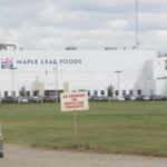 There are about 100 active cases of COVID-19 in Brandon, including 61 employees at the Maple Leaf hog processing plant in the city. Maple Leaf can continue to operate, despite the new designation for the Brandon area, mostly because the packing plant is not the source of transmission. | File photo